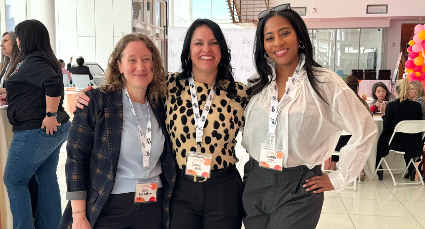 Casey Kenworthy (L), Sunni Hall, and Danielle Smith gather at the fourth annual conference.